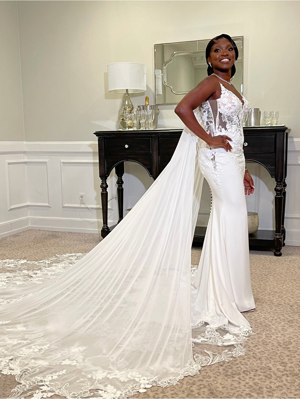 Elegant White Bridal Gown with Lace Appliqué and Chapel Train